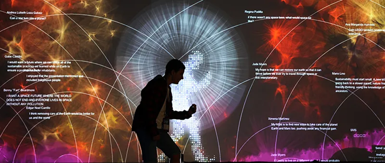 A person standing in front of a large screen

AI-generated content may be incorrect.