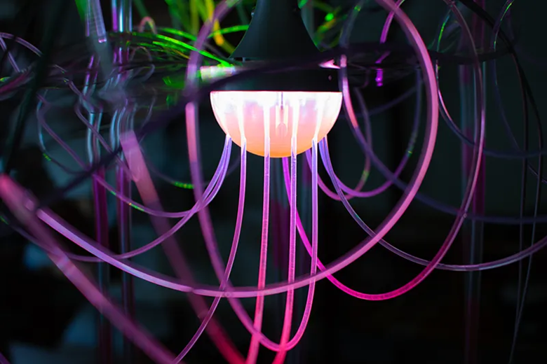 A light fixture with many colored tubes

AI-generated content may be incorrect.