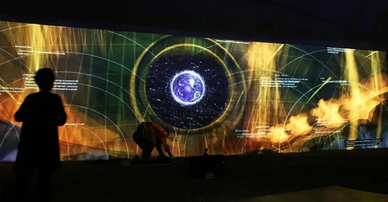 A large screen with a picture of a planet

AI-generated content may be incorrect.